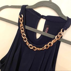 Dressy blue tank top with gold chain neckline